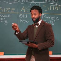 Professional instructor smiling in a lime shaded circle